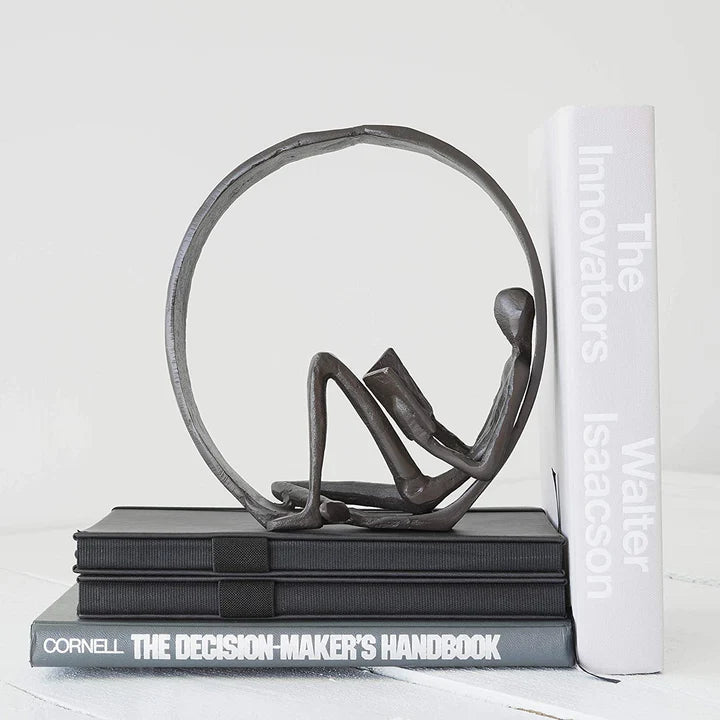 Encircled Reader Iron Sculpture