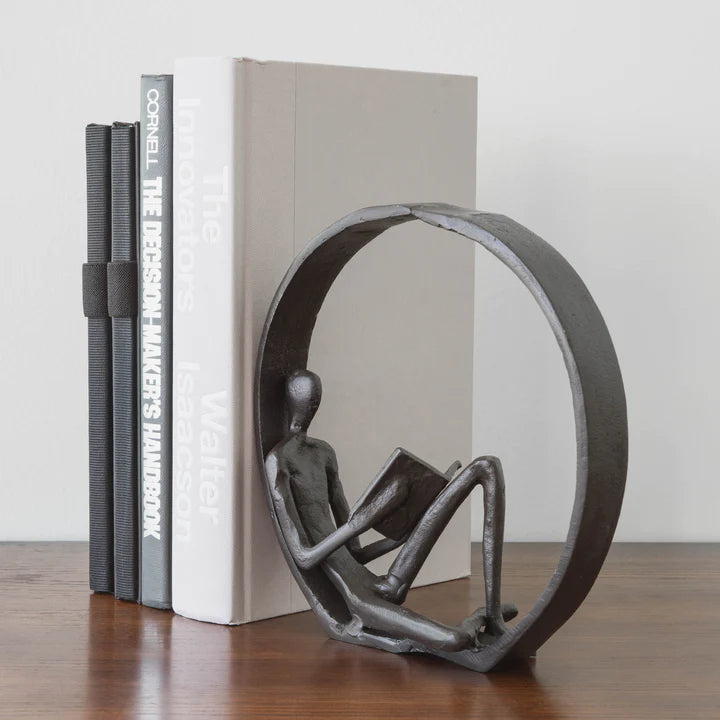 Encircled Reader Iron Sculpture